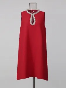 Elegant red sleeveless straight dress featuring a sparkling rhinestone jeweled neckline.