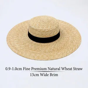 High-resolution detail of a fine natural wheat straw hat with a 13cm wide brim.