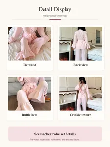 Detailaufnahmen des rosa Seersucker-Pyjama-Robensets mit Rüschensaum und Bindegürtel