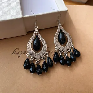 Vintage silver-toned hook earrings with faceted black waterdrop tassels for women