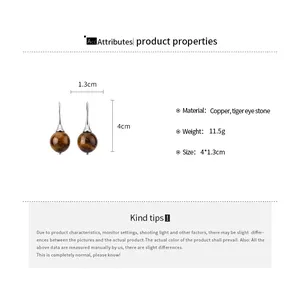 Detail infographic of vintage tiger eye stone drop earrings with size and material specs