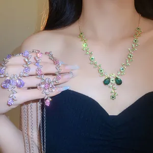 Detailed macro view of the sparkle floral rhinestone necklace set for bridal wedding jewelry.