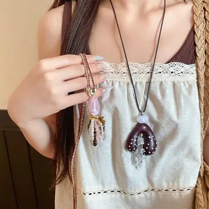 Boho-Acryl-Halskette mit Herz-Quasten und Lederband im ethnischen Stil für Damen