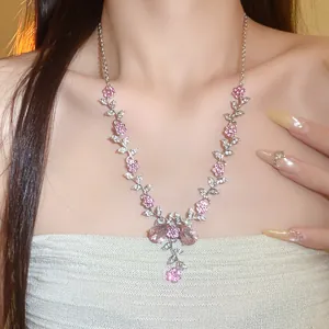 Close-up of elegant pink flower necklace with sparkling rhinestones for bridal weddings