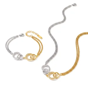 Elegantes zweifarbiges Halsketten- und Armbandset mit ineinandergreifenden Ringen