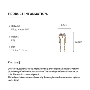 Detailed product information and dimensions for long tassel drop earrings with crystals