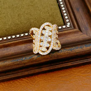 Macro view of geometric twisted oval ring with intricate zircon pavé setting