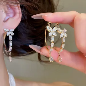 Funkelnde Zirkonia Schleife Wassertropfen Quaste Ohrringe Für Damen Kupfer Eingelegt Zirkonia Hängende Creolen Schmuck Geschenk
