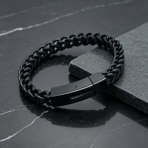 Close-up of black stainless steel dragon bone chain bracelet with square clasp