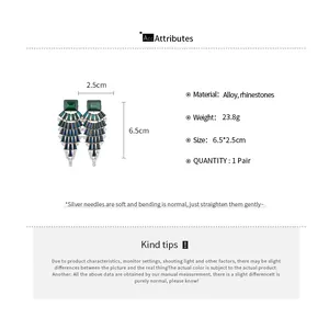 Detail view of rhinestone fan-shaped dangling earrings with size and material info