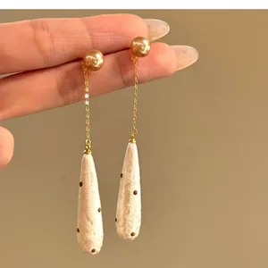 French vintage teardrop earrings with elegant brown polka dots and pearl chain design
