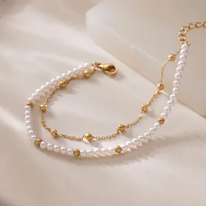 Élégant bracelet double couche plaqué or 18 carats avec perles blanches et boules d'or