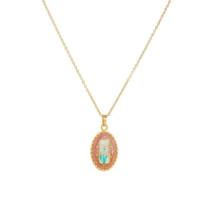 Detailed view of vintage enamel floral pendant necklace in gold-plated stainless steel