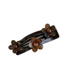 Elegante acryl haarspeld met bruine bloemmotieven voor de haarstyling van vrouwen