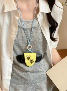 Fashionable yellow leather glasses holder necklace with blue braided rope detail
