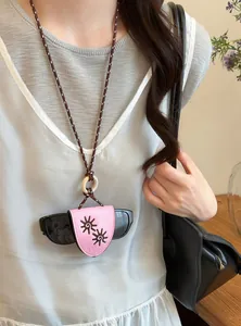 Stylish pink leather sunglasses holder necklace for women, perfect for daily fashion outfits