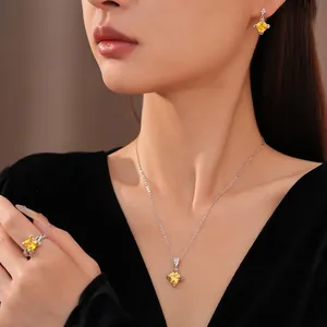 Elegante zilveren sieradenset met gele vierkante zirkoon hanger ketting en oorbellen