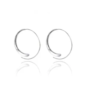 Minimalist silver hoop earrings with an elegant curved line design on a white background