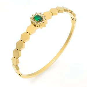 Bracelet jonc vintage en acier inoxydable plaqué or 18 carats avec motif tournesol