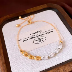 Elegant 18k gold plated drawstring bracelet with textured oval beads