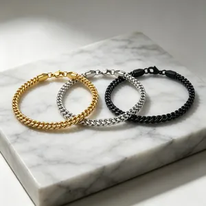 Set of three 3mm stainless steel wheat chain bracelets in gold, silver and black