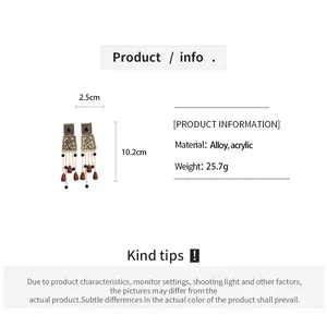 Boucles d'oreilles vintage en alliage et acrylique avec dimensions 10,2 cm x 2,5 cm.