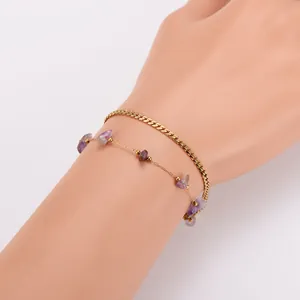 Close-up detail view of a 304 stainless steel double-layered gold bracelet with purple stones