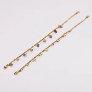 Close-up detail of 18k gold plated stainless steel bracelet with irregular stones