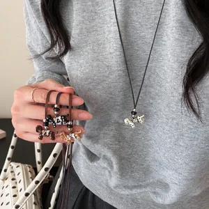 Koreanisches Emaille Polka Dot Hund Lederseil Halskette Leichter Luxus Langer Pullover Kette Persönlichkeit Anhänger Damen