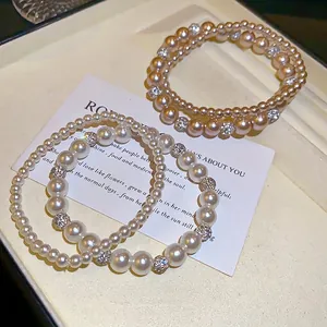 Franse stijl parel armband set met klei kristallen bollen in wit en roze afwerking