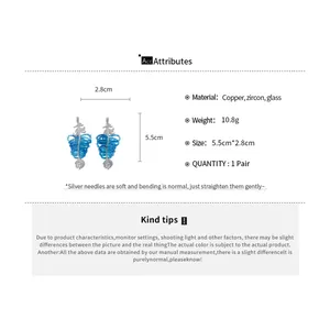 Détails des boucles d'oreilles feuilles en zircon bleu avec dimensions et spécifications