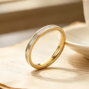 Elegant 2mm stainless steel ring featuring a lustrous mother-of-pearl inlay detail.