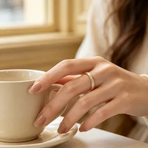 Elegant 2mm stainless steel ring with white mother of pearl inlay detail on finger