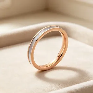 Close-up of elegant 2mm stainless steel ring with natural white shell inlay detail
