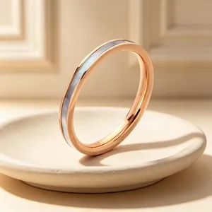 Close-up of 2mm rose gold stainless steel ring with elegant mother of pearl shell inlay