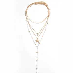 Elegante set di collane dorate a quattro strati con perle e ciondoli a cuore e stella