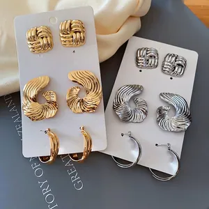 Ensemble de boucles d'oreilles géométriques en métal or et argent au design plissé