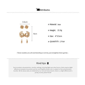 Produktdetails für Vintage Gold Ohrringe Set mit plissierten geometrischen Anhängern.