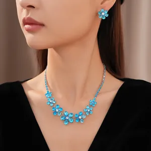 Stunning close-up view of blue flower zircon necklace set with matching stud earrings