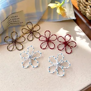 Boucles d'oreilles fleurs ajourées à pois avec aiguilles argent s925