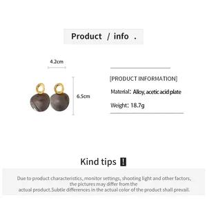 Détail des boucles d'oreilles rétro avec dimensions et spécifications des matériaux