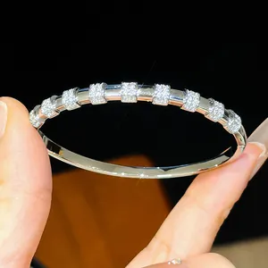 Macro shot of a luxury 18K gold plated bracelet featuring pave-set zircon stones