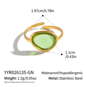 Detailed product view of a vintage green gemstone open ring with dimensions and specs