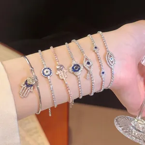 Elegant luxury sparkling zircon evil eye bracelets set for women featuring Hamsa hand design