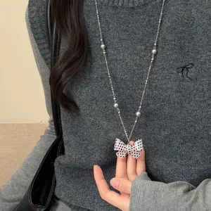 Koreaanse stijl halsketting met polkadot strikhanger voor dames als lange trui-ketting