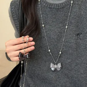 Koreaanse Stijl Stippen Strik Kunstparel Lange Trui Ketting Voor Dames Legering Hars Elegante Mode Accessoire Hanger Ketting