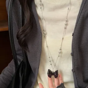 Collier élégant avec pendentif nœud à pois de style coréen et perles pour femmes