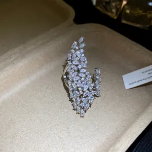 Detailed macro view of a silver marquise cubic zirconia leaf cluster statement cocktail ring