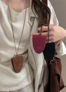 Close-up of magnetic neck-hanging glasses clip pendant necklace in multiple colors