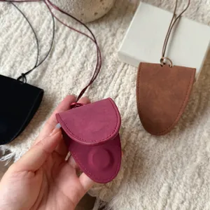 Detail of wine red magnetic leather glasses holder necklace for autumn and winter